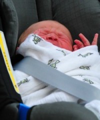 Prince in a Car Seat: The newest British royal is whisked away from the hospital. Will he face the knife anytime soon? 